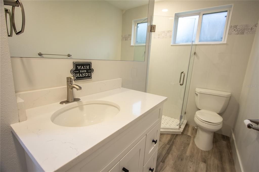 Bathroom, Glass Shower, Interior, Recessed Lighting, Wood Texture Flooring