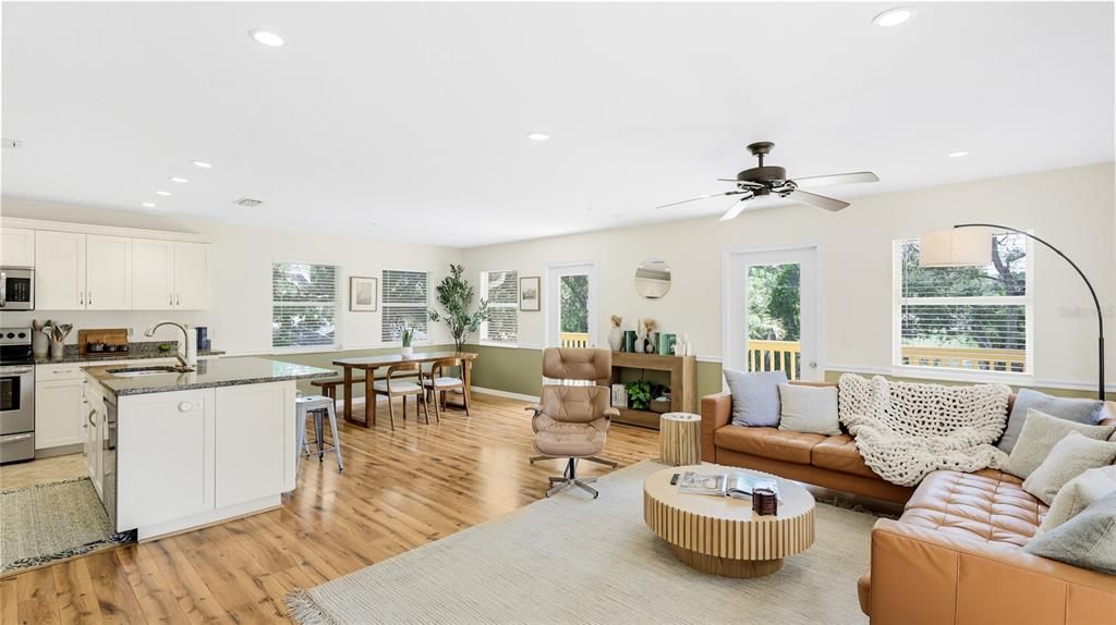Dining room, Interior, Kitchen, Living room, Recessed Lighting, Stainless Steel Appliances, Wood Texture Flooring
