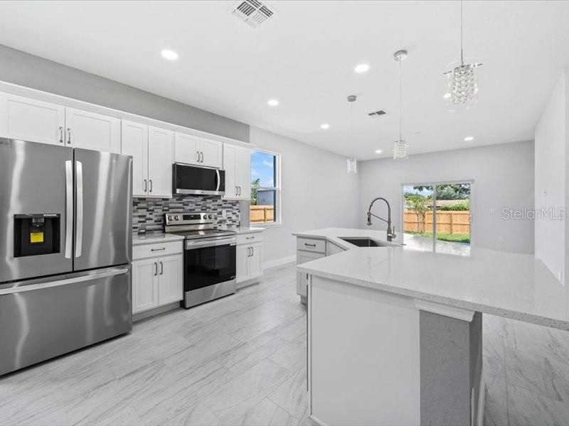 Interior, Kitchen, Marble, Pendant Lights, Recessed Lighting, Stainless Steel Appliances