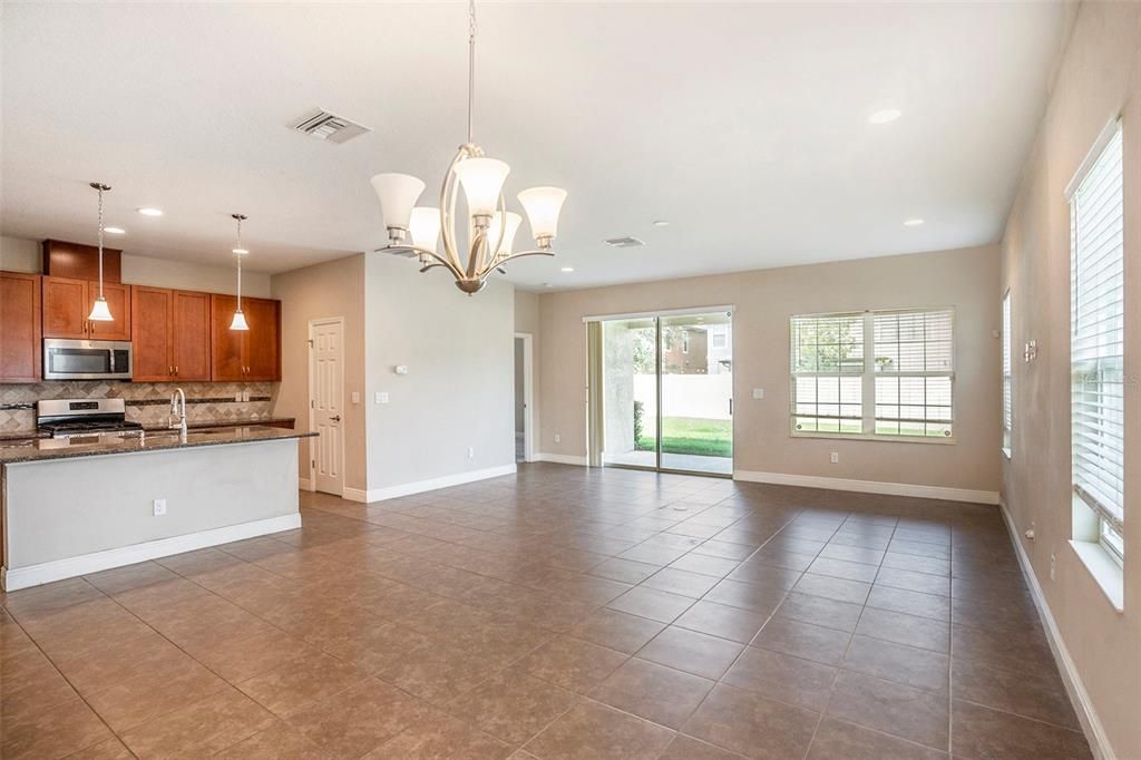 Chandelier, Empty room, Interior, Kitchen, Pendant Lights, Recessed Lighting, Stainless Steel Appliances