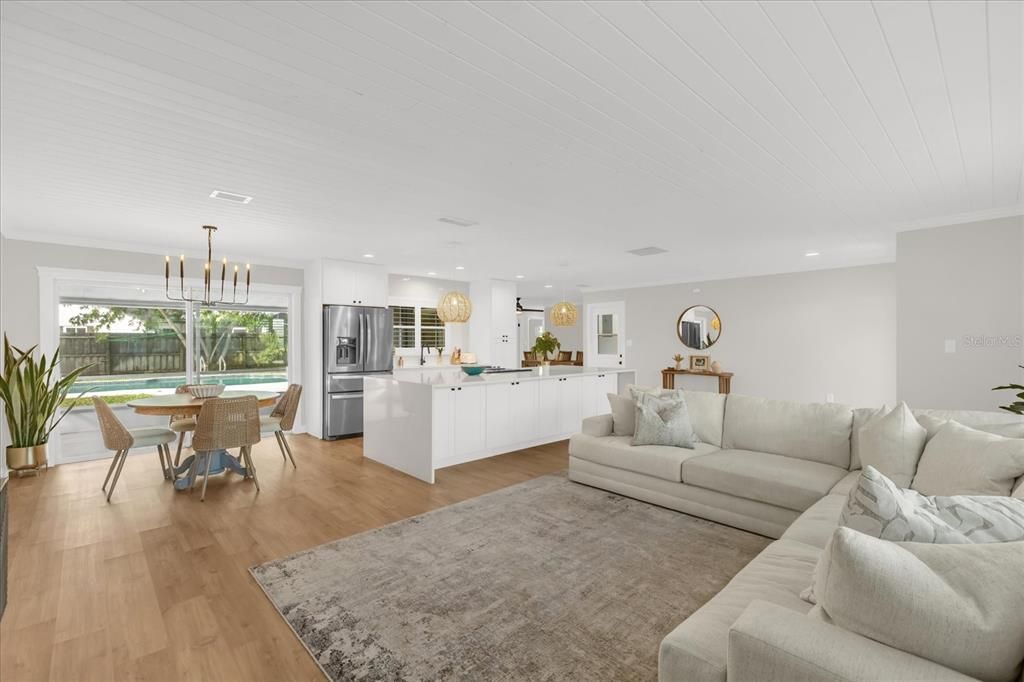Dining room, Interior, Kitchen, Living room, Pendant Lights, Recessed Lighting, Stainless Steel Appliances, Wood Texture Flooring
