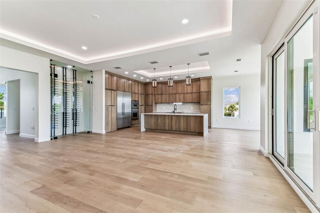 Interior, Kitchen, Pendant Lights, Recessed Lighting, Stainless Steel Appliances, Wood Texture Flooring