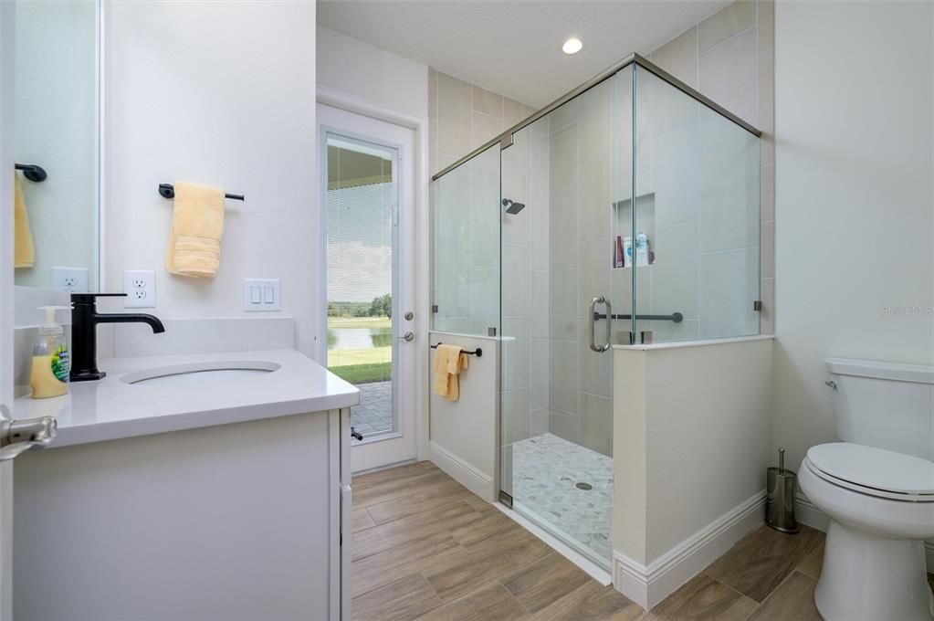 Bathroom, Glass Shower, Interior, Recessed Lighting, Wood Texture Flooring