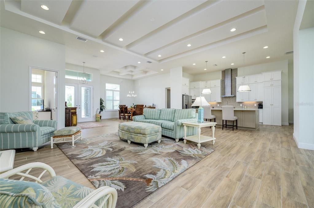 Dining room, Interior, Kitchen, Living room, Pendant Lights, Recessed Lighting, Stainless Steel Appliances, Wood Texture Flooring