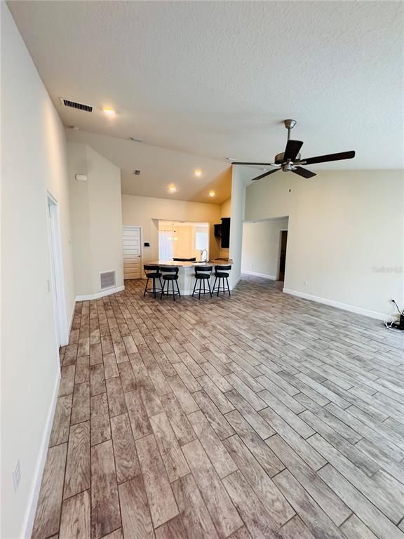 Dining room, Empty room, Interior, Kitchen, Recessed Lighting, Wood Texture Flooring