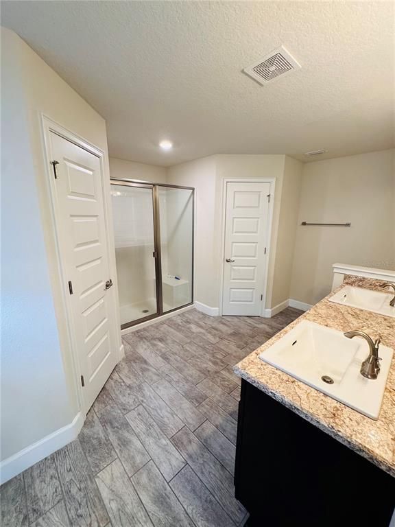 Bathroom, Glass Shower, Interior, Recessed Lighting, Wood Texture Flooring