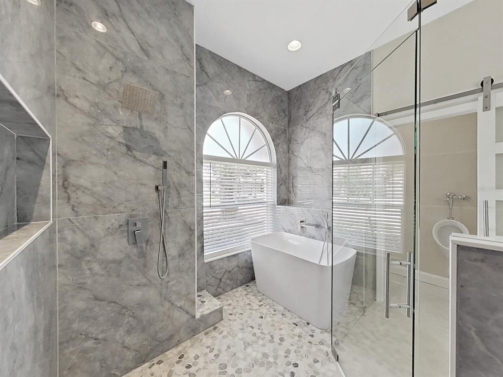 Bathroom, Free Standing Baths, Glass Shower, Interior, Marble Walls, Recessed Lighting