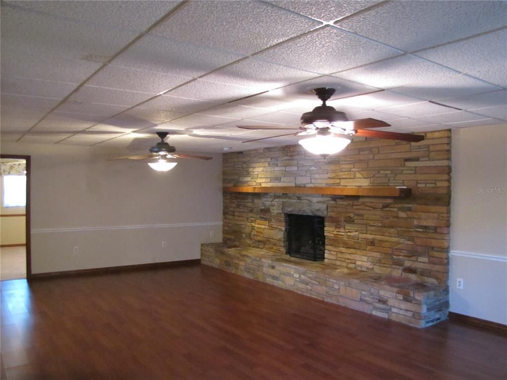 Empty room, Fireplace, Interior, Stone Walls, Wood Texture Flooring