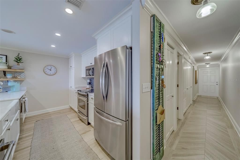 Interior, Kitchen, Recessed Lighting, Stainless Steel Appliances, Wood Texture Flooring