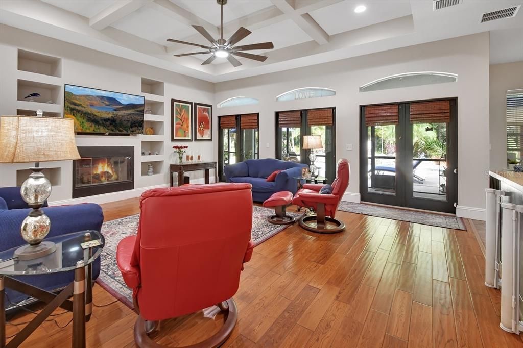 Fireplace, Interior, Living room, Recessed Lighting, Wood Texture Flooring