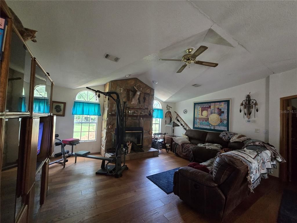 Fireplace, Fitness Equipment, Interior, Living room, Wood Texture Flooring