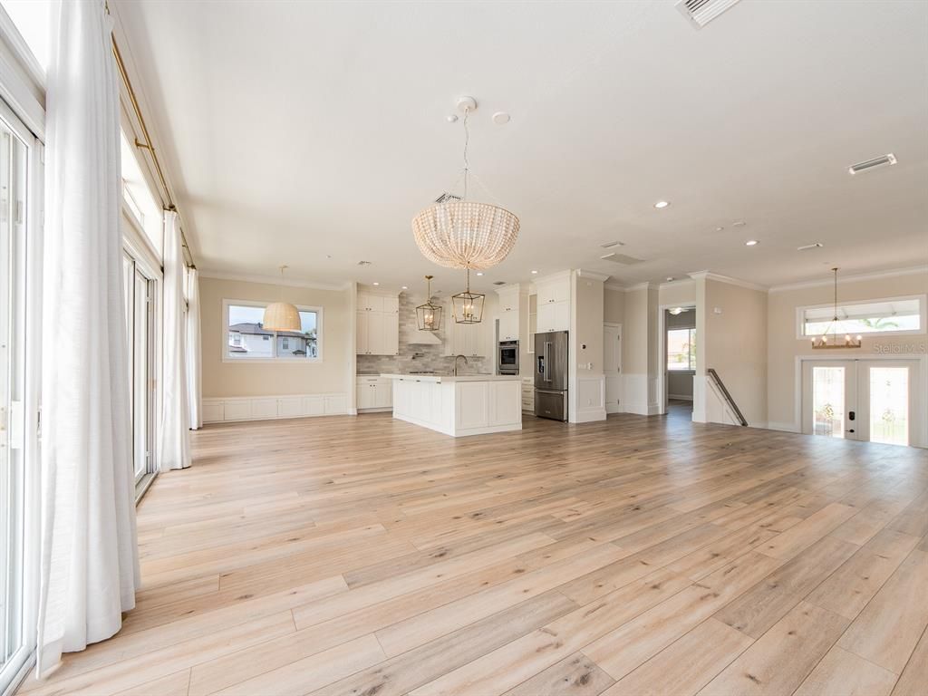 Chandelier, Empty room, Interior, Kitchen, Pendant Lights, Recessed Lighting, Wood Texture Flooring