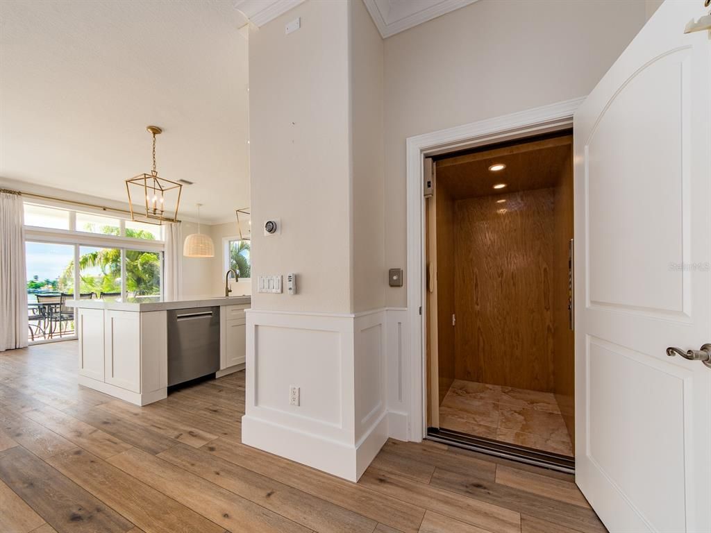 Elevator, Interior, Pendant Lights, Recessed Lighting, Wooden Ceilings, Wood Texture Flooring, Wooden Walls