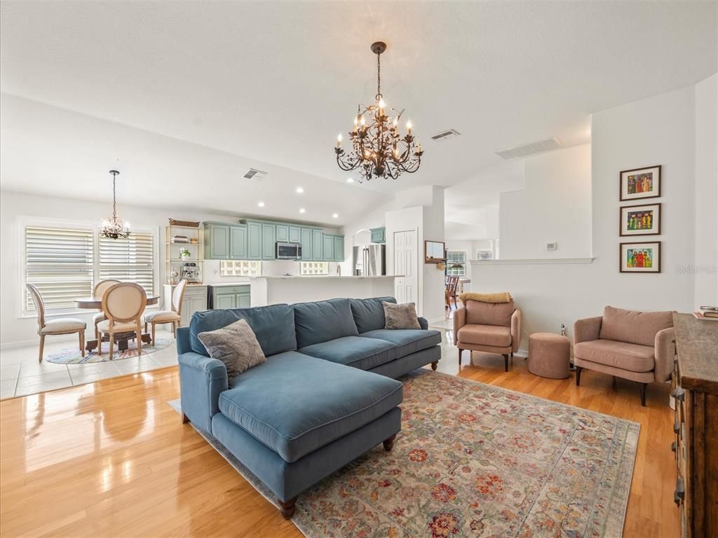 Chandelier, Dining room, Interior, Kitchen, Living room, Recessed Lighting, Wood Texture Flooring