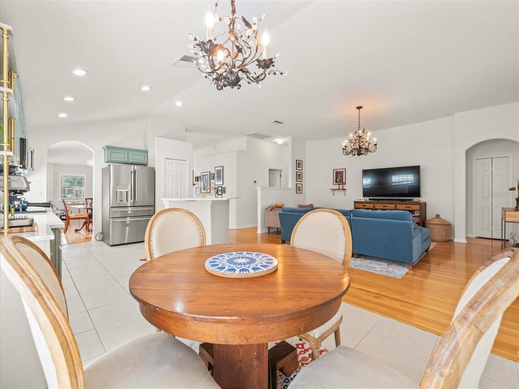 Chandelier, Dining room, Interior, Kitchen, Living room, Recessed Lighting, Stainless Steel Appliances, Wood Texture Flooring
