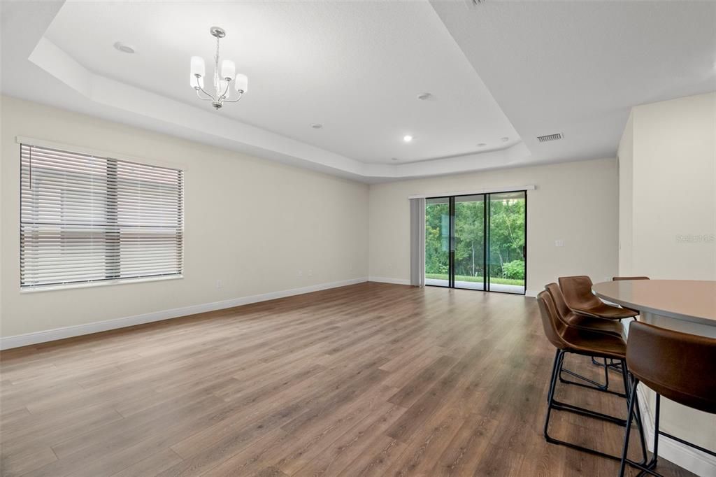 Chandelier, Dining room, Empty room, Interior, Recessed Lighting, Wood Texture Flooring