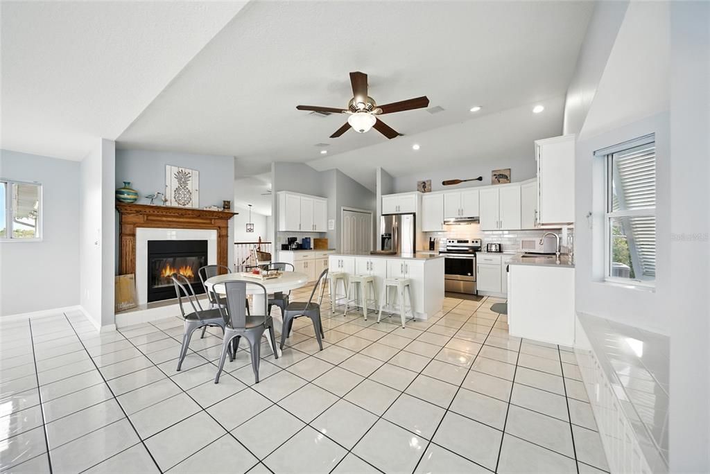 Dining room, Fireplace, Interior, Kitchen, Recessed Lighting, Stainless Steel Appliances