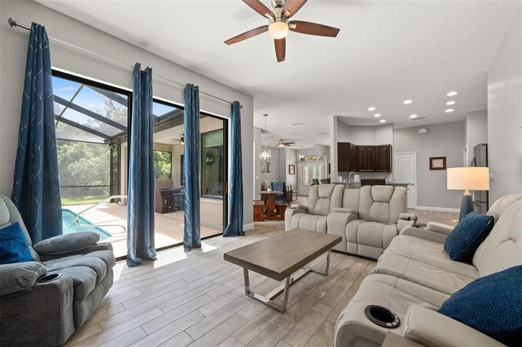 Dining room, Interior, Kitchen, Living room, Pendant Lights, Recessed Lighting, Stainless Steel Appliances, Wood Texture Flooring