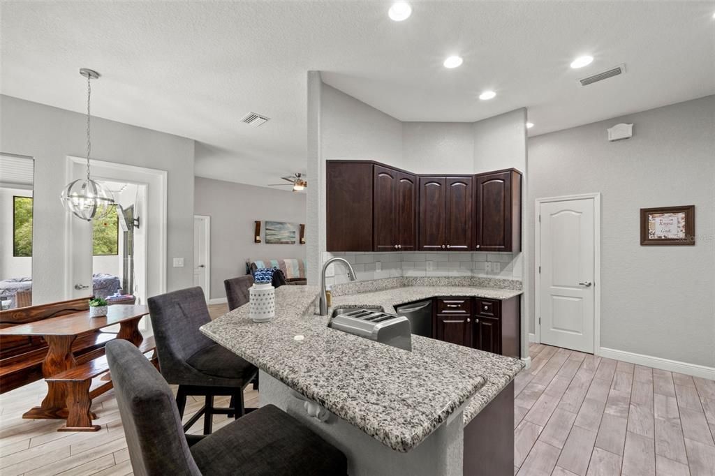 Chandelier, Dining room, Interior, Kitchen, Pendant Lights, Recessed Lighting, Wood Texture Flooring
