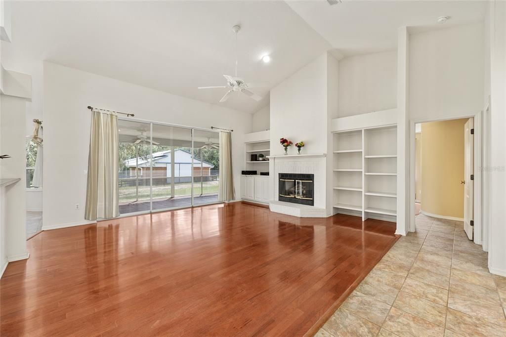 Empty room, Fireplace, Interior, Recessed Lighting, Wood Texture Flooring