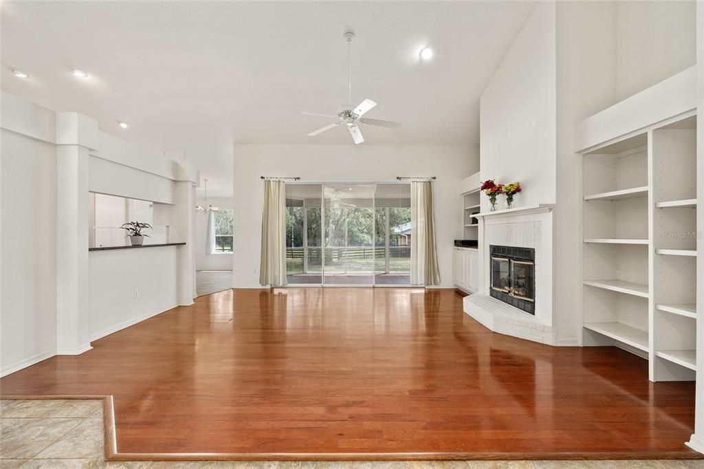 Empty room, Fireplace, Interior, Recessed Lighting, Wood Texture Flooring