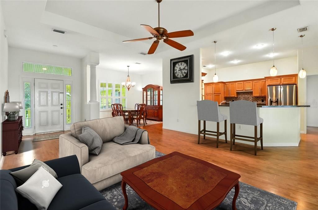Chandelier, Dining room, Interior, Kitchen, Living room, Pendant Lights, Recessed Lighting, Stainless Steel Appliances, Wood Texture Flooring
