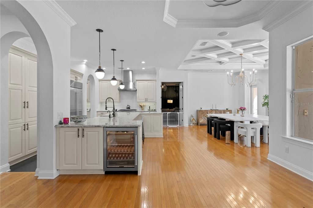 Chandelier, Dining room, Interior, Kitchen, Pendant Lights, Recessed Lighting, Stainless Steel Appliances, Wood Texture Flooring