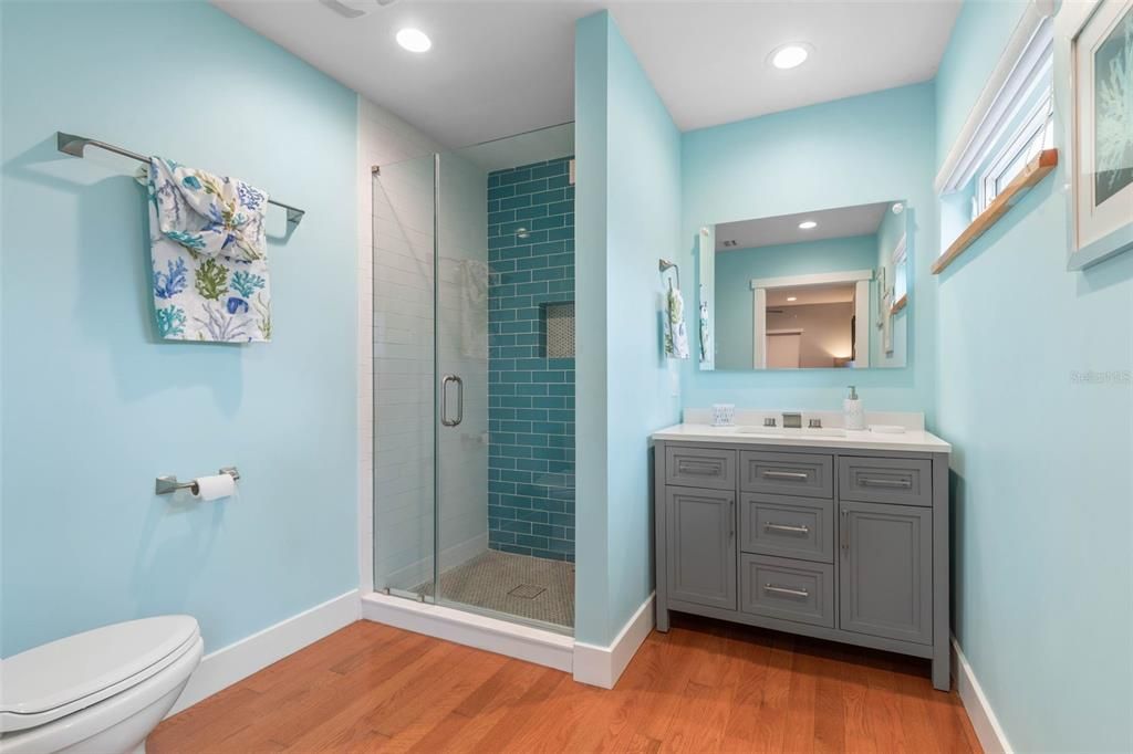 Bathroom, Glass Shower, Interior, Recessed Lighting, Wood Texture Flooring