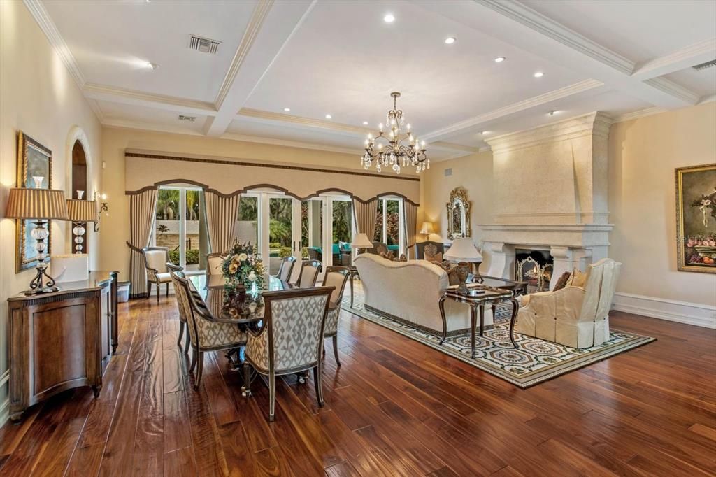 Chandelier, Dining room, Fireplace, Interior, Living room, Recessed Lighting, Wood Texture Flooring