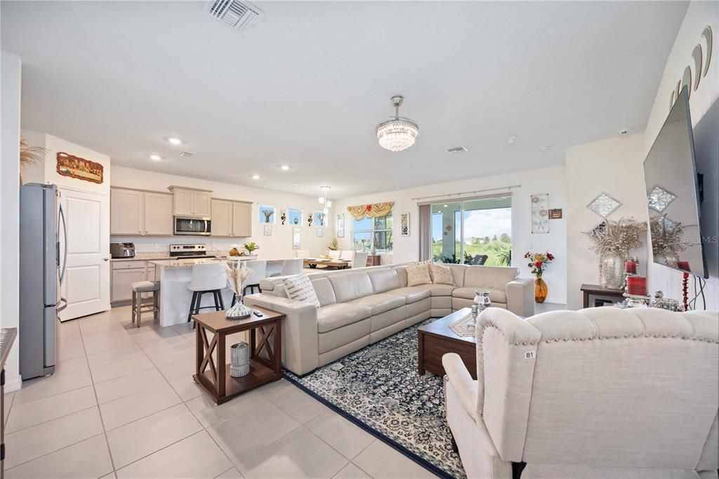 Chandelier, Dining room, Interior, Kitchen, Living room, Recessed Lighting, Stainless Steel Appliances