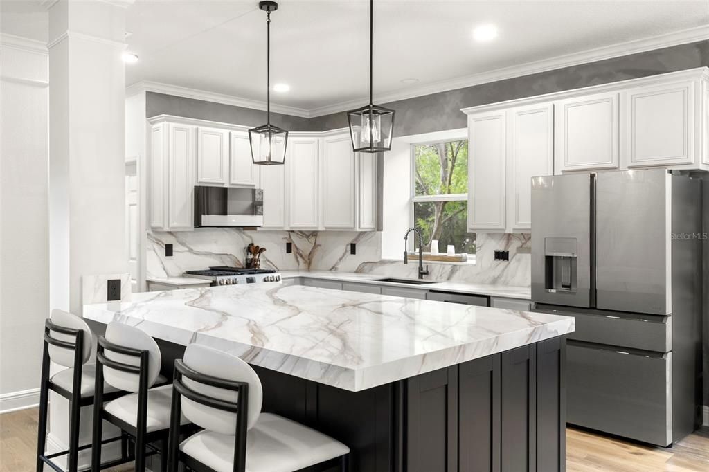Interior, Kitchen, Marble Walls, Pendant Lights, Recessed Lighting, Stainless Steel Appliances, Wood Texture Flooring