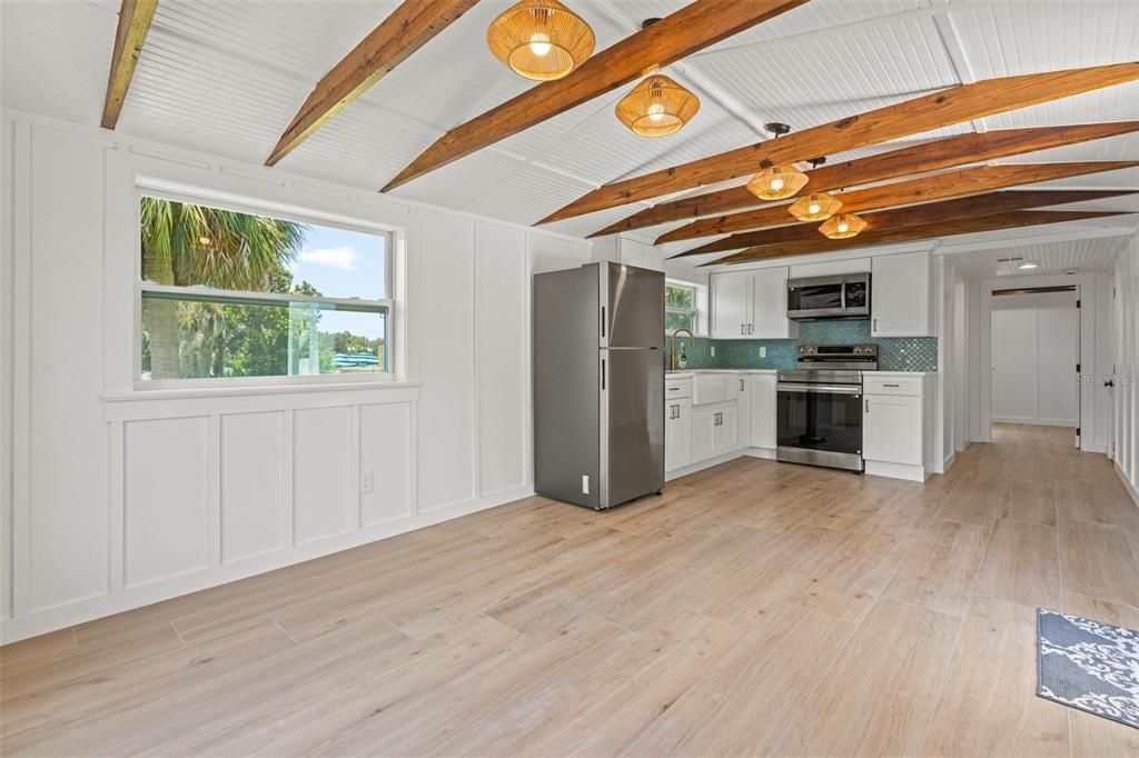 Empty room, Interior, Kitchen, Stainless Steel Appliances, Wooden Beams, Wood Texture Flooring