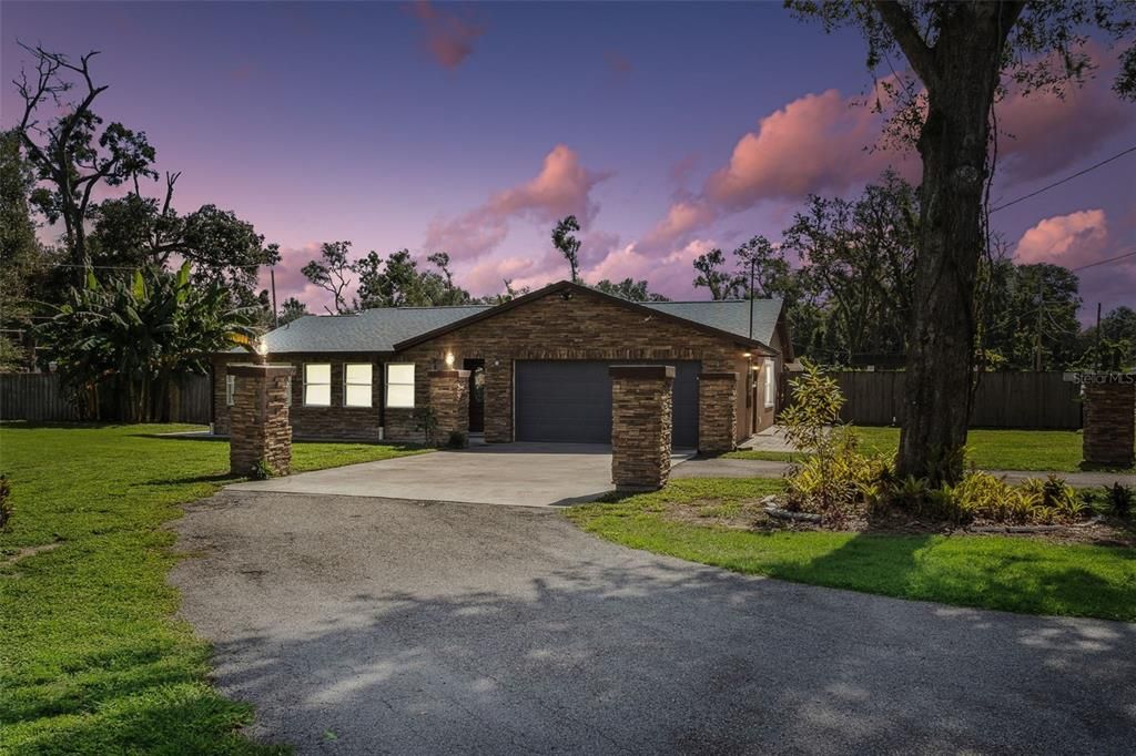 Attached, Backyard, Exterior, Facade, Brick Facade, Ranch