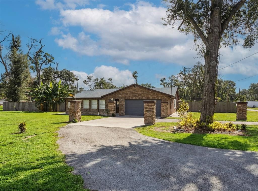 Attached, Backyard, Exterior, Facade, Brick Facade, Ranch