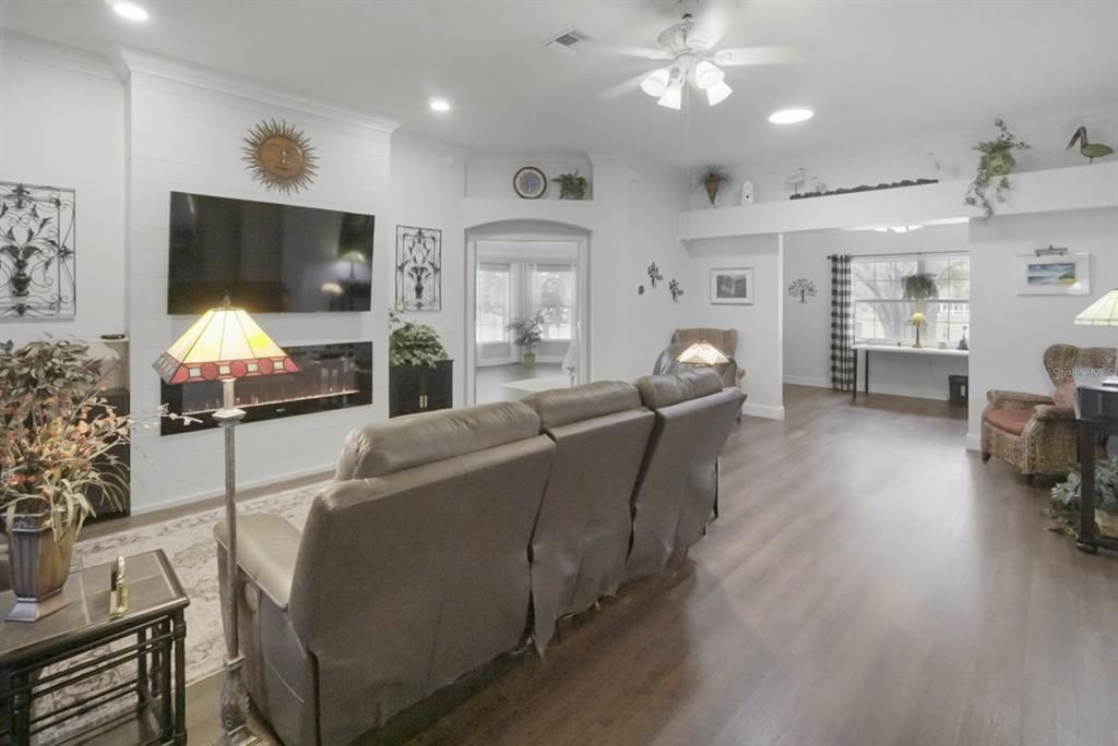 Fireplace, Interior, Living room, Recessed Lighting, Wood Texture Flooring