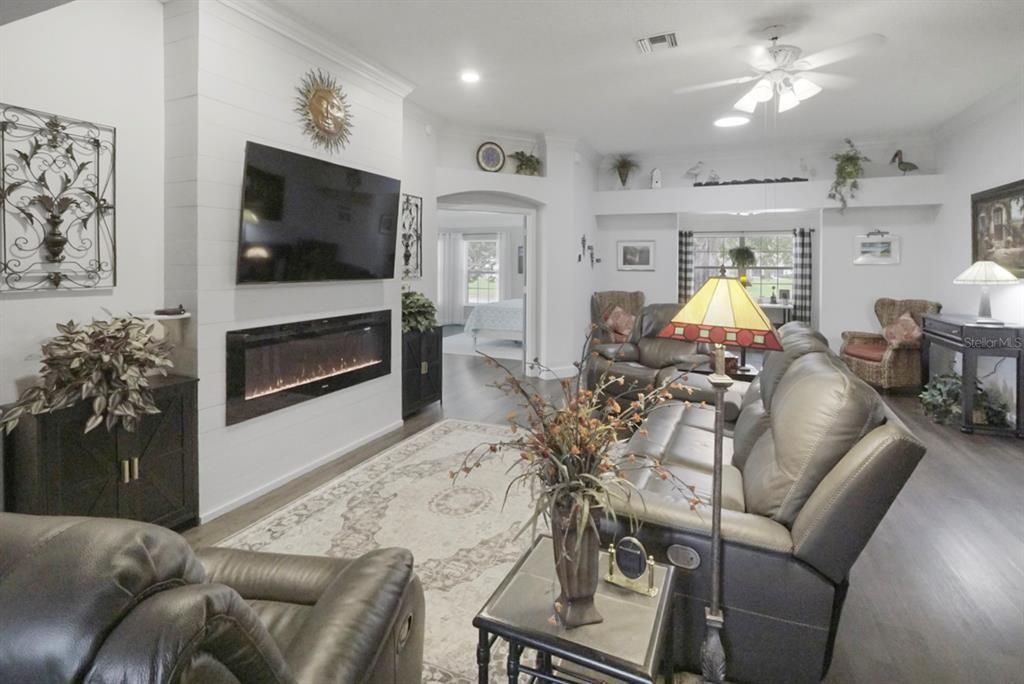 Fireplace, Interior, Living room, Recessed Lighting, Wood Texture Flooring