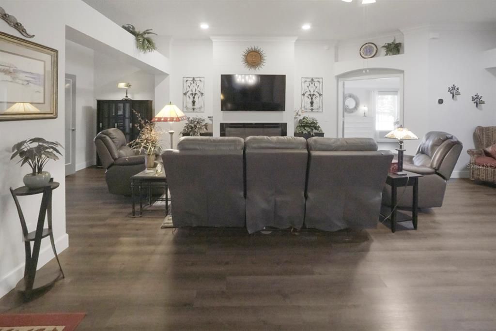 Fireplace, Interior, Living room, Recessed Lighting, Wood Texture Flooring