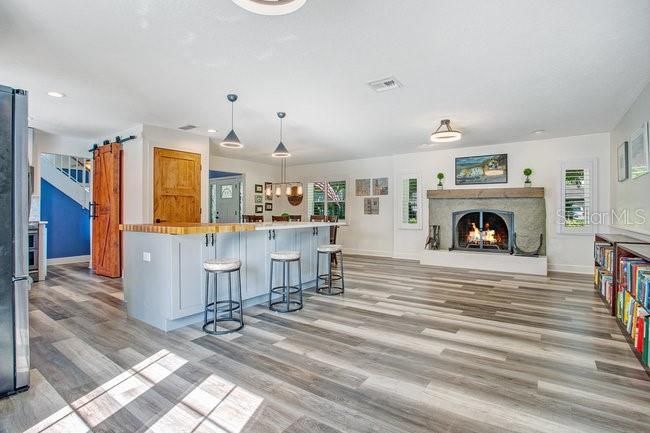 Fireplace, Interior, Pendant Lights, Recessed Lighting, Wood Texture Flooring