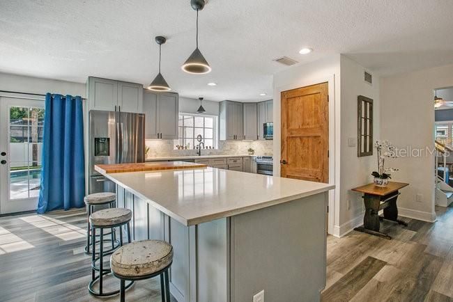 Interior, Kitchen, Pendant Lights, Recessed Lighting, Stainless Steel Appliances, Wood Texture Flooring
