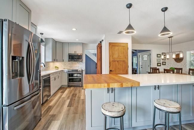 Interior, Kitchen, Pendant Lights, Recessed Lighting, Stainless Steel Appliances, Wood Texture Flooring