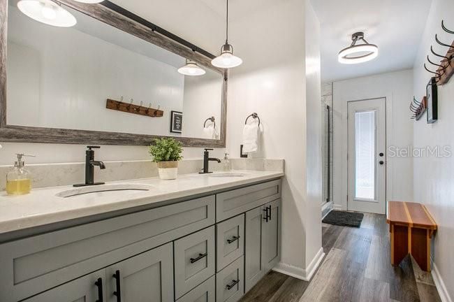 Bathroom, Dual Sink Vanities, Interior, Pendant Lights, Wood Texture Flooring