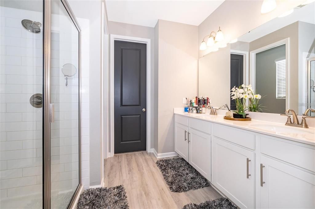 Bathroom, Dual Sink Vanities, Glass Shower, Interior, Wood Texture Flooring