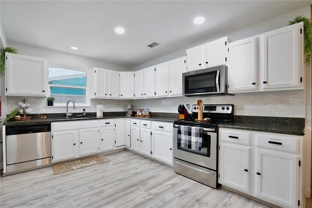 Interior, Kitchen, Recessed Lighting, Stainless Steel Appliances, Wood Texture Flooring