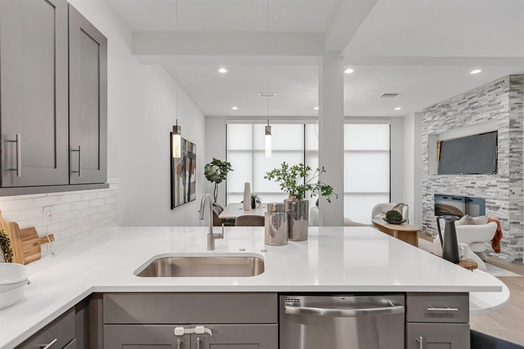 Interior, Kitchen, Pendant Lights, Recessed Lighting, Stainless Steel Appliances, Stone Walls