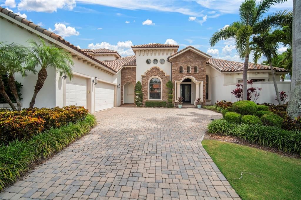 Attached, Backyard, Exterior, Facade, Brick Facade, Mediterranean