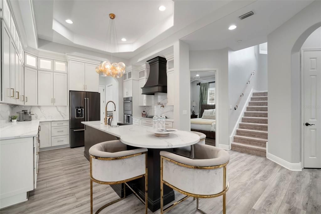 Interior, Kitchen, Marble Walls, Pendant Lights, Recessed Lighting, Stainless Steel Appliances, Wood Texture Flooring