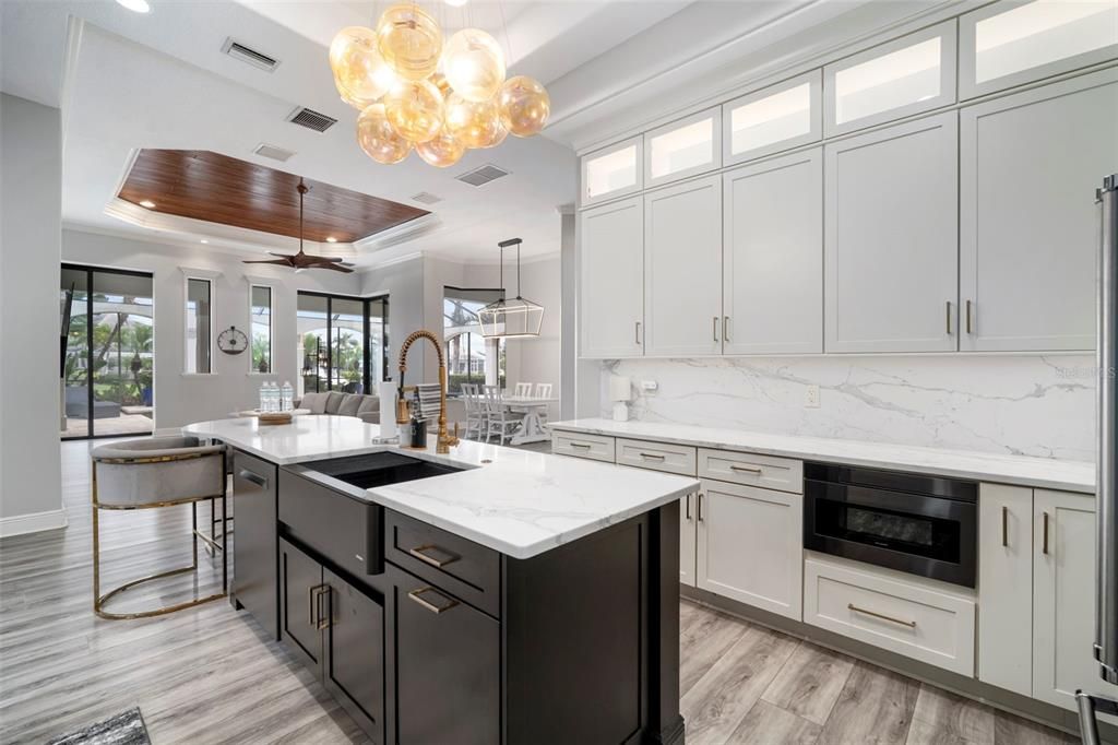 Interior, Kitchen, Marble Walls, Pendant Lights, Recessed Lighting, Stainless Steel Appliances, Wooden Ceilings, Wood Texture Flooring