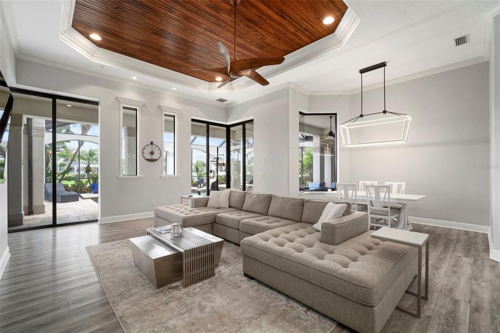 Dining room, Interior, Living room, Pendant Lights, Recessed Lighting, Wooden Ceilings, Wood Texture Flooring