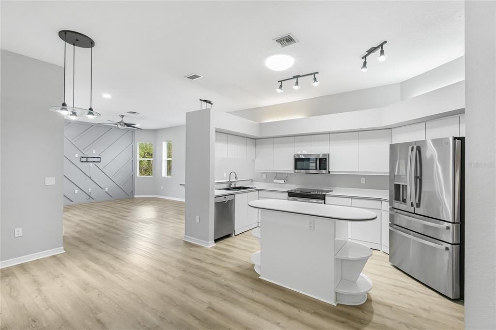 Interior, Kitchen, Pendant Lights, Recessed Lighting, Stainless Steel Appliances, Wood Texture Flooring