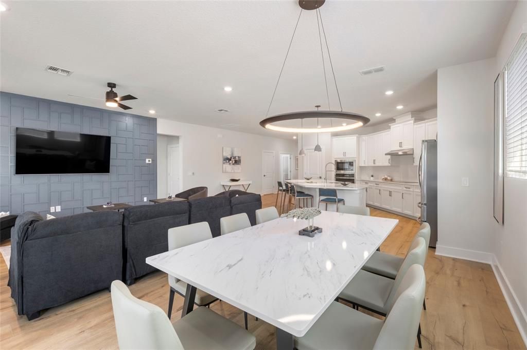 Dining room, Interior, Kitchen, Living room, Pendant Lights, Recessed Lighting, Stainless Steel Appliances, Wood Texture Flooring